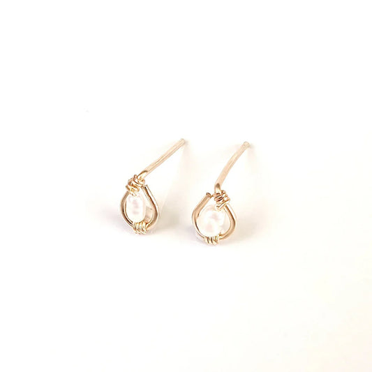 Freshwater rice pearls centered in 14k gold filled stud earring.