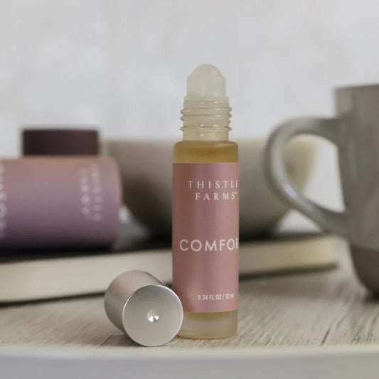 Thistle Farms Comfort essential oil roll-on combines clary sage, clove, and ylang-ylang.