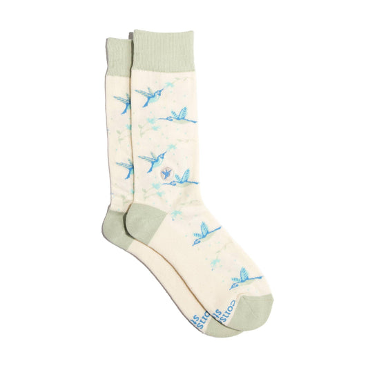 Cream-colored crew socks with hummingbirds on a white background