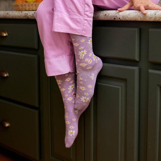 Lavender crew socks with floral pattern on a white background
