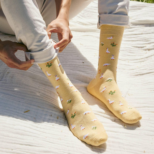 Yellow crew socks with goose pattern made with organic cotton