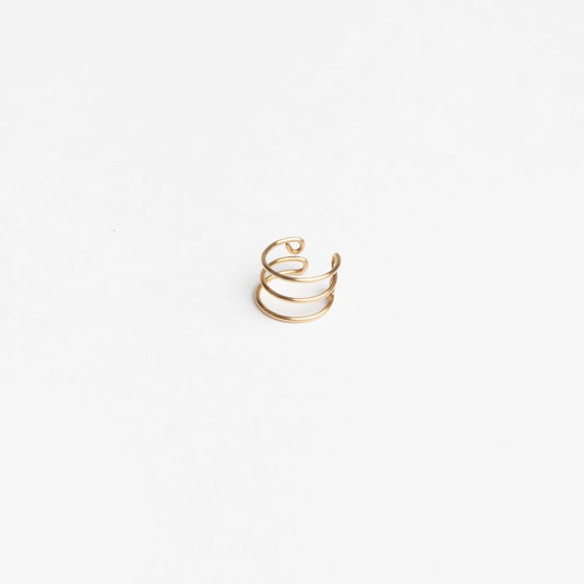 Woman wearing Journey of Hope Ear Cuff in 14k gold filled paired with Journey of Hope Huggie Earring.