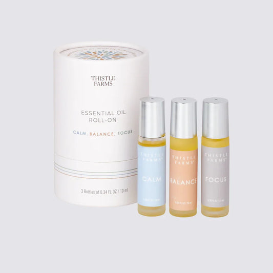 Thistle Farms Rest essential oil roll-on Trio for Calm, Balance and Focus.