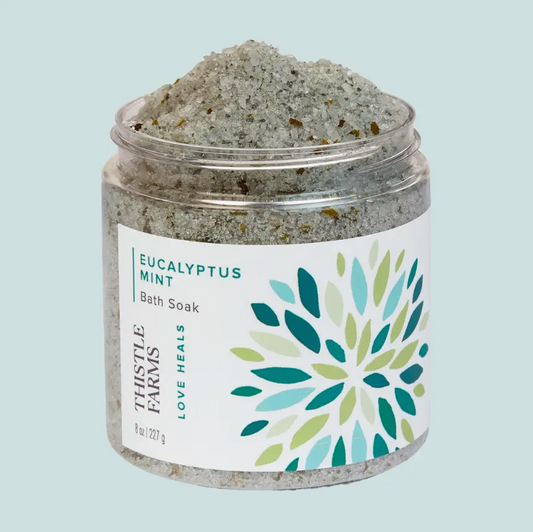 Refreshing Eucalyptus Mint bath salt soak handcrafted by Thistle Farms.