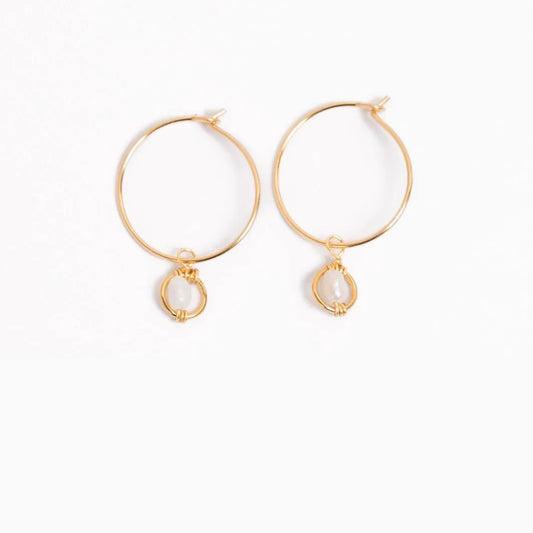 Woman wearing Mini-hoop Freshwater Pearl Charm Earrings.
