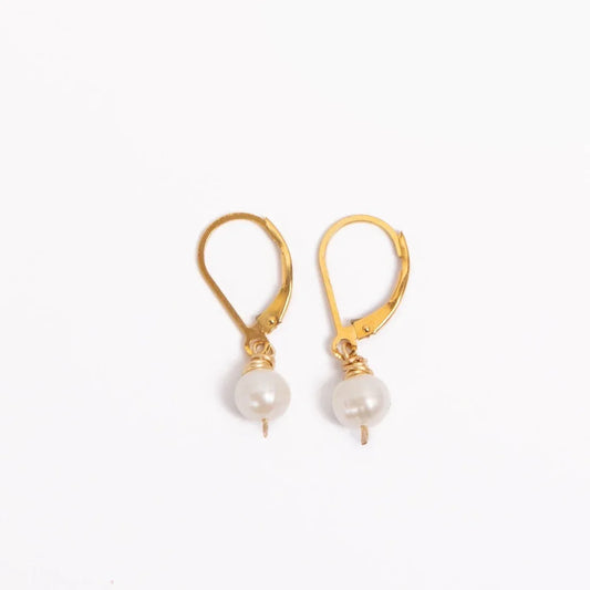 Woman wearing Leeda Freshwater Pearl Leverback Earrings in 14k gold filled.