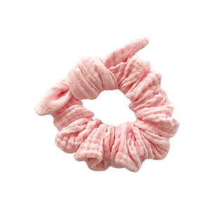 Pink double cotton gauze scruchie with tie on white background Pink double cotton gauze scruchie with tie on white background