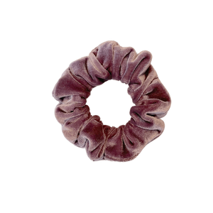 Plum velvet scrunchie on white backgroud Plum velvet scrunchie on white backgroud
