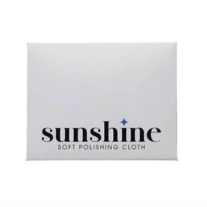 Sunshine brand soft yellow polishing cloth in white envelope on a white background Sunshine brand soft yellow polishing cloth in white envelope on a white background