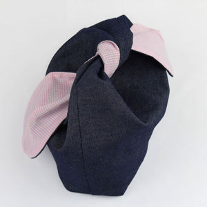 a denim and pink gingham makeup bag that ties at the top a denim and pink gingham makeup bag that ties at the top