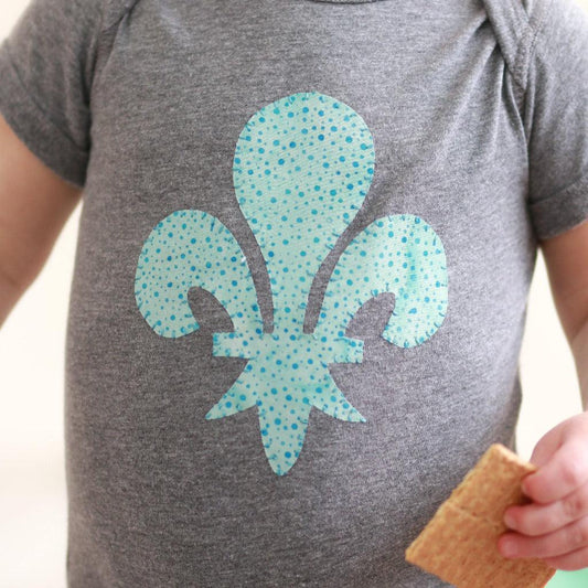 Onesie with Hand-Appliqued Batik Fleur de Lis - Forai