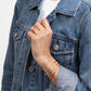Woman in denim jacket wearing the adjustable Journey of Hope Brass.Ring 