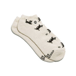 Beige ankle socks with black cat illustrations on a white background
