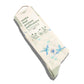 Crew socks with hummingbird design and packaging that says socks that protect pollinators on a white background
