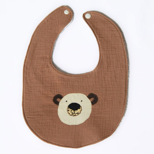 brown baby bib made of double cotton guaze with bear face design on a white background