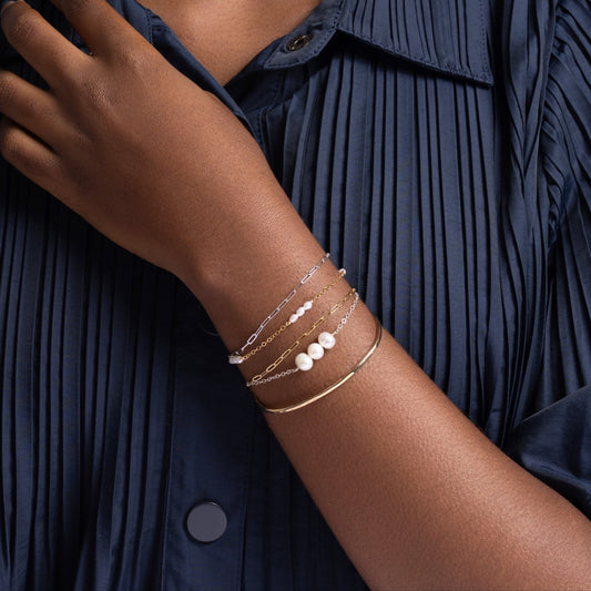 Hammered Brass Bangle, a classic, minimalist design, on white background