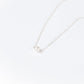 The Leeda Pearl Necklace in Sterling Silver features a classic single freshwater pearl on a delicate chain.
