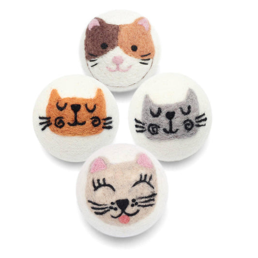 a reusable wool dryer ball with a cute gray cat face design on a white background