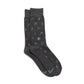 Dark gray socks with musical note pattern on a white background