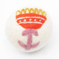 Orange flower dryer ball made with 100% organic wool. Fair Trade.