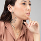 Woman in beige blouse wearing Moab Western Beaded Earrings and Necklace in 14k Gold Filled. Horseshoe pendant wrapped with turquoise beads. Threader earrings.