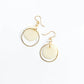 Hadeelah Porcelain Earrings, Brass hoop encircling a disc of porcelain clay hanging from 14k gold filled fishhook ear wires.