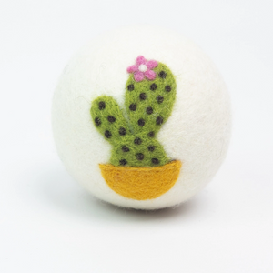 eco wool dryer ball with cute cactus design on a white background