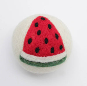 eco friendly wool dryer ball with watermelon design on a white background