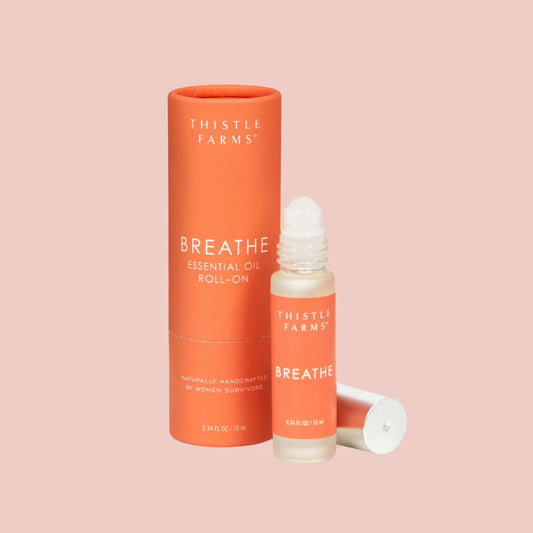 Thistle Farms Breathe essential oil roll-on Eucalyptus Peppermint "Breathe" blend.