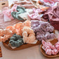 a display of scrunchies made of double cotton gauze in various colors
