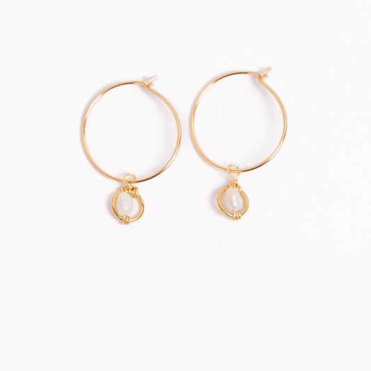 Woman wearing Mini-hoop Freshwater Pearl Charm Earrings.