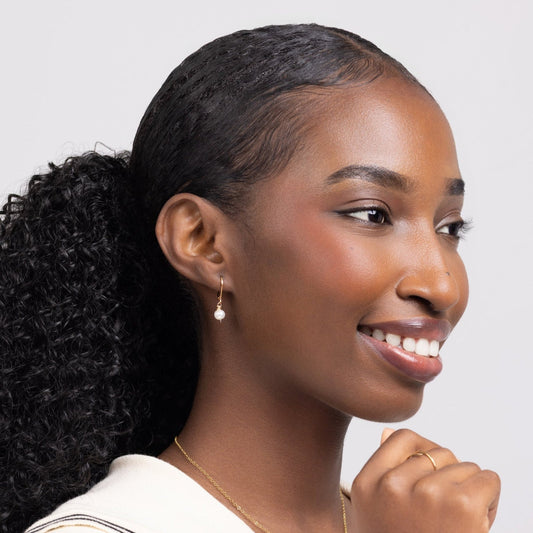 Woman wearing Leeda Freshwater Pearl Leverback Earrings in 14k gold filled.