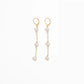 Freshwater pearl triple drop leverback earrings in 14k gold filled on a white background