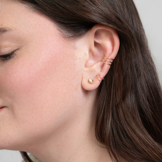 Freshwater rice pearls centered in 14k gold filled stud earring.