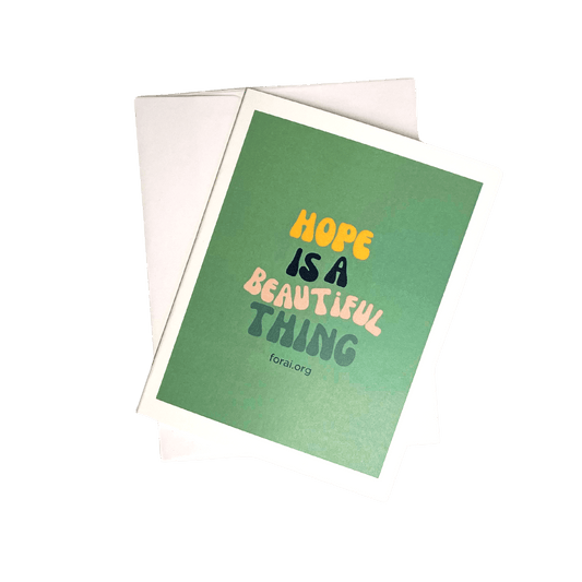 A stack of blank lagoon blue notecards with the inspirational message 'Hope is a beautiful thing' written in multi-colored text, accompanied by an envelope.