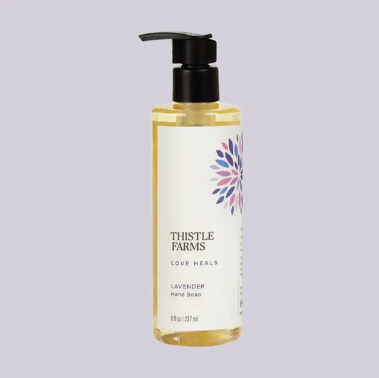Bottle of Thistle Farms lavender hand soap. Handcrafted.