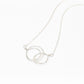 Zomi Circles of Unity Necklace features sterling silver interlocking circles. 