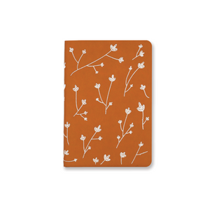Layflat embroidered floral journal notebook that supports schools. 
