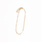 14k gold filled paperclip chain bracelet on a white background