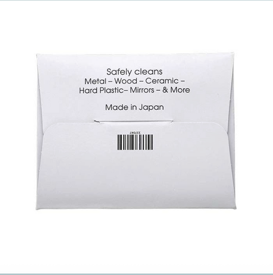 Sunshine brand soft yellow polishing cloth in white envelope on a white background