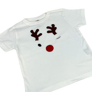 Festive white toddler tee featuring winking reindeer with red nose, hand-appliqued. 