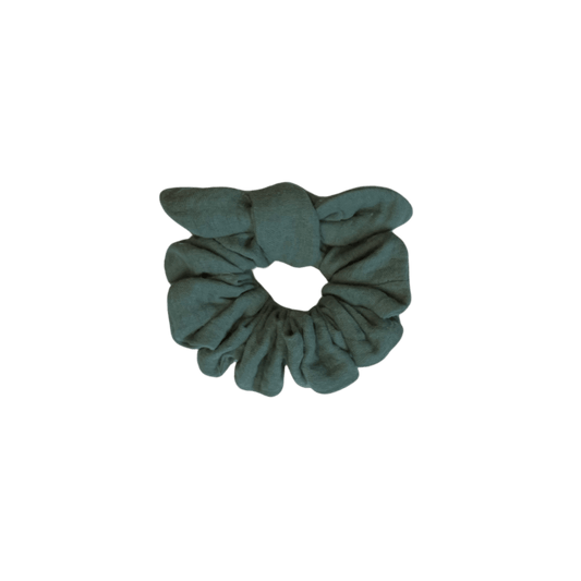 Handmade lagoon blue double cotton gauze scrunchie on white background