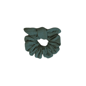 Handmade lagoon blue double cotton gauze scrunchie on white background