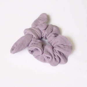 a lavender scrunchie made of double cotton gauze on a white background
