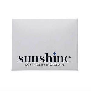 Sunshine brand soft yellow polishing cloth in white envelope on a white background