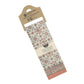 Floral patterned kitchen towel with cardboard holder on a white background
