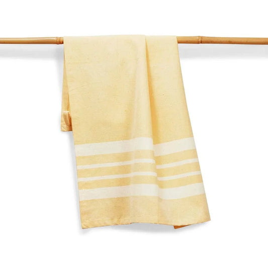 Yellow towel with white stripes hanging on a wooden rack against a white background