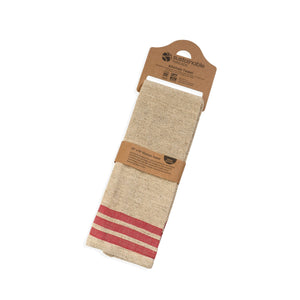 Beige towel with red stripes in packaging on a white background
