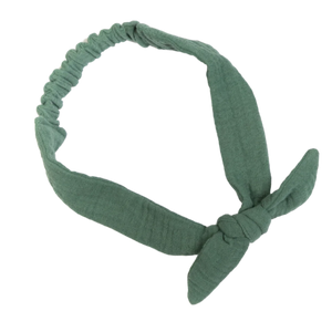 A handmade, adjustable green blue double cotton gauze tie headband for kids on a white background.