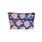 Blue Jaipur block print zipper pouch with pink floral pattern on a bright blue background